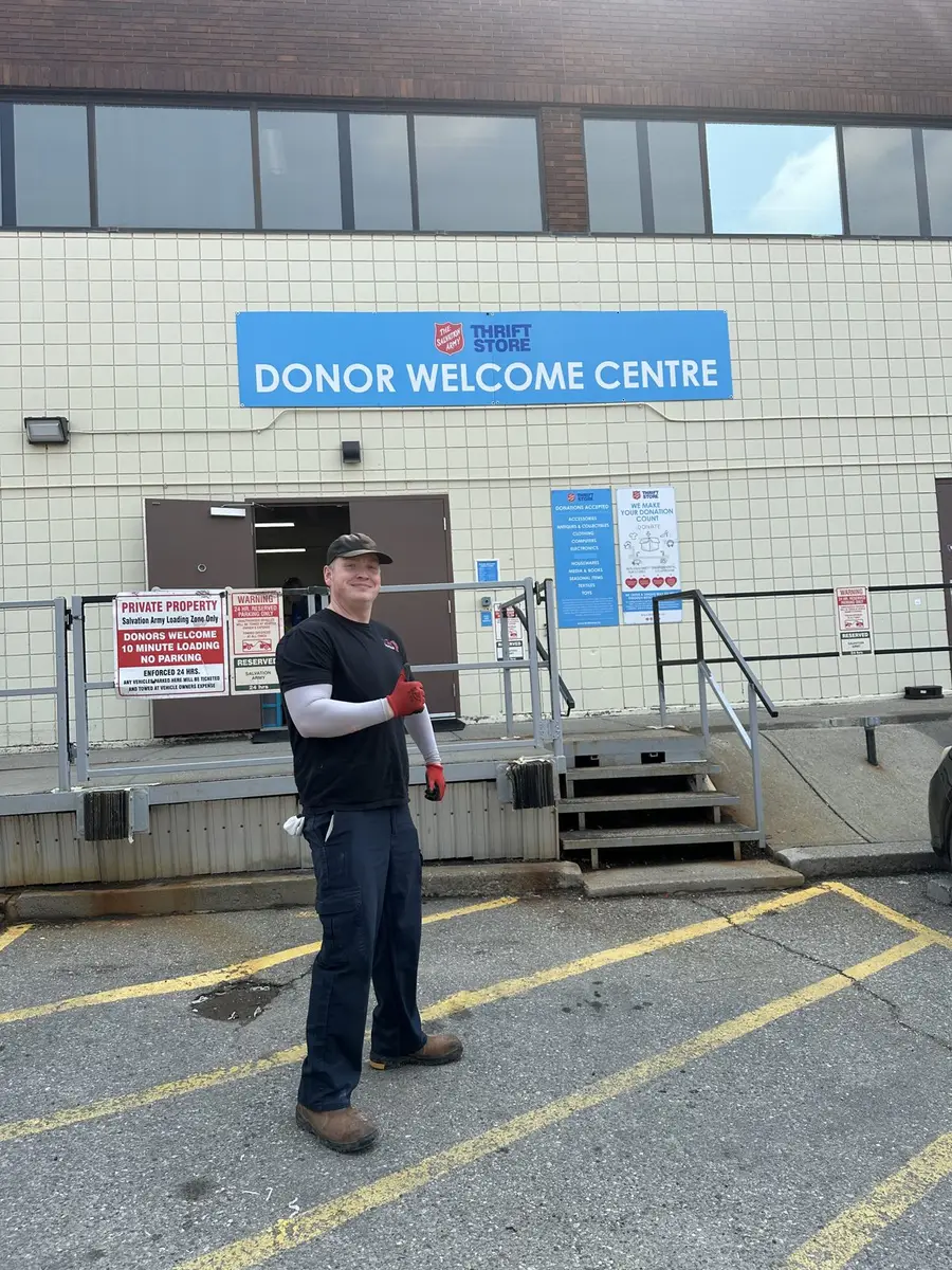 TJ dropping a load at a local donation centre